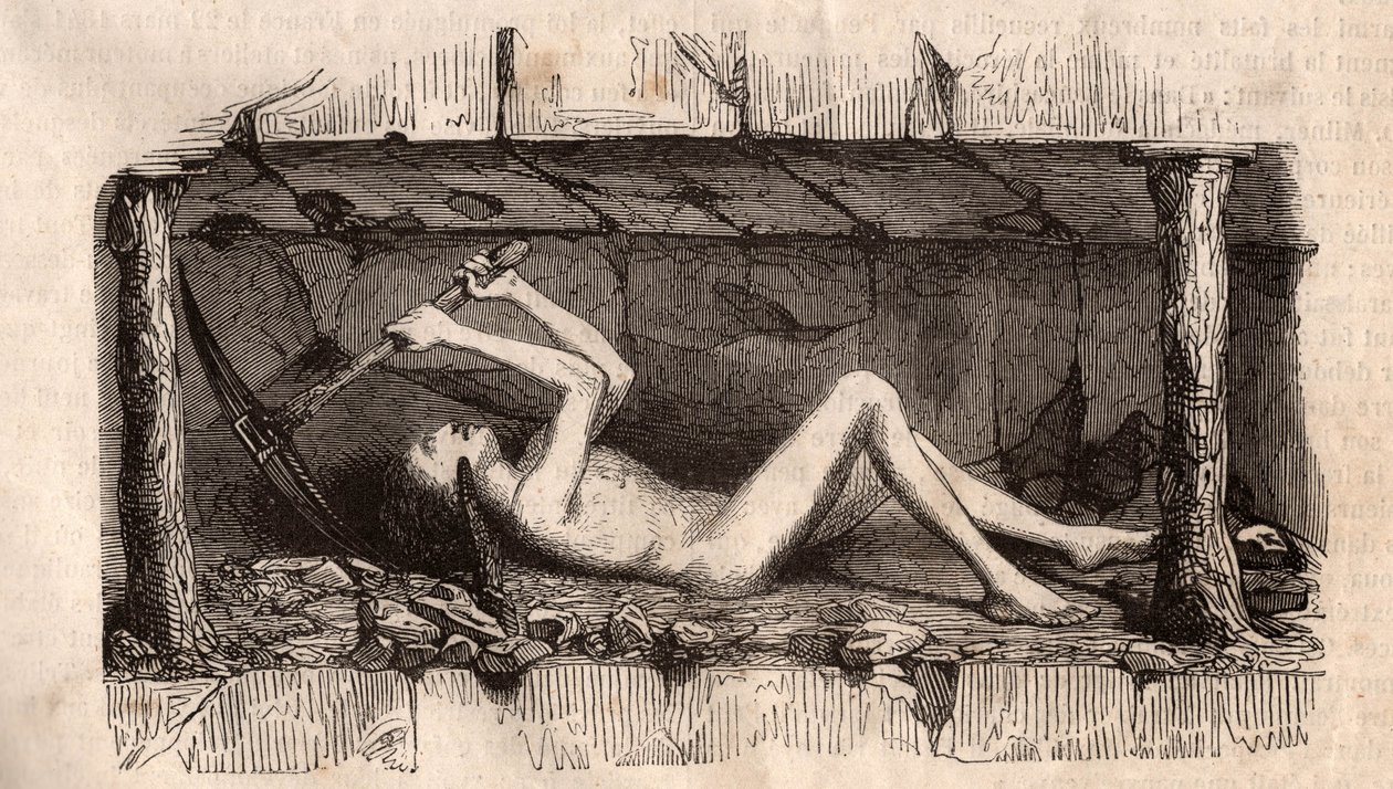Ein junger Mann, der auf dem Boden liegt und die Decke eines Tunnels in einer englischen Kohlenmine aufpickt von Unknown