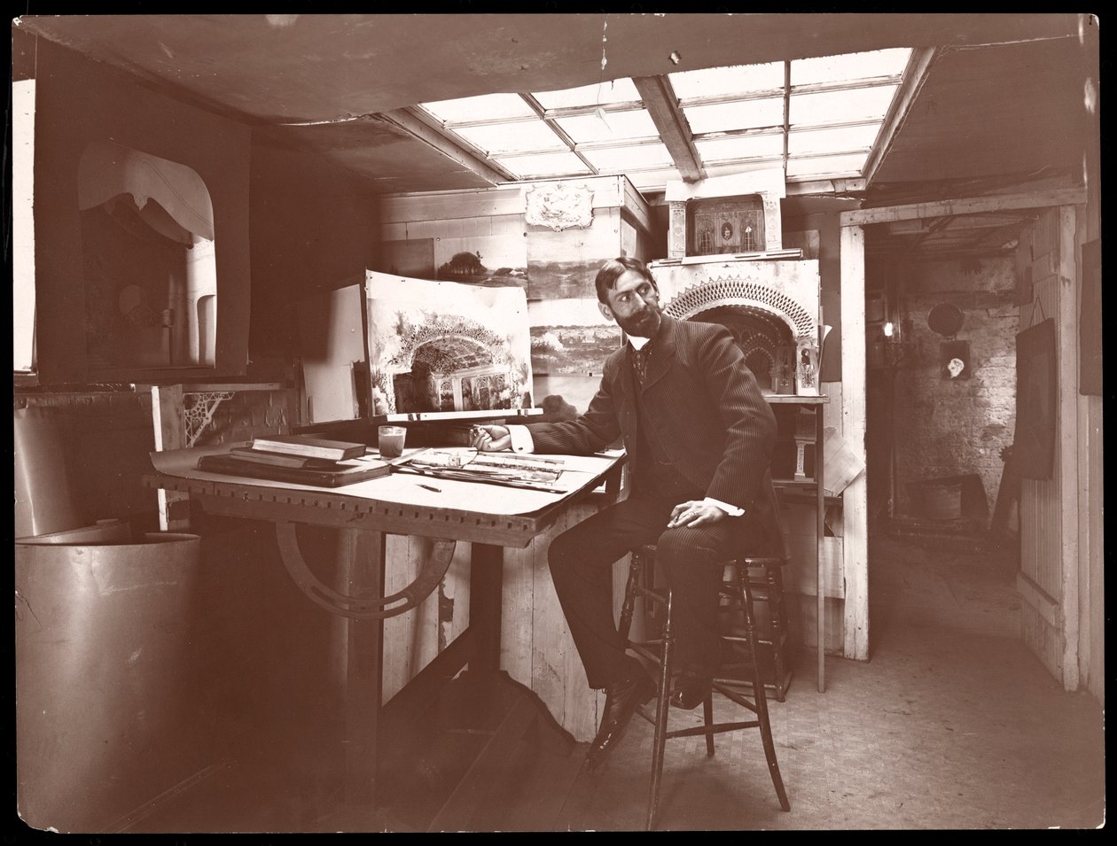 Ein Bühnenbildner in seinem Studio, New York, 1901 von Byron Company