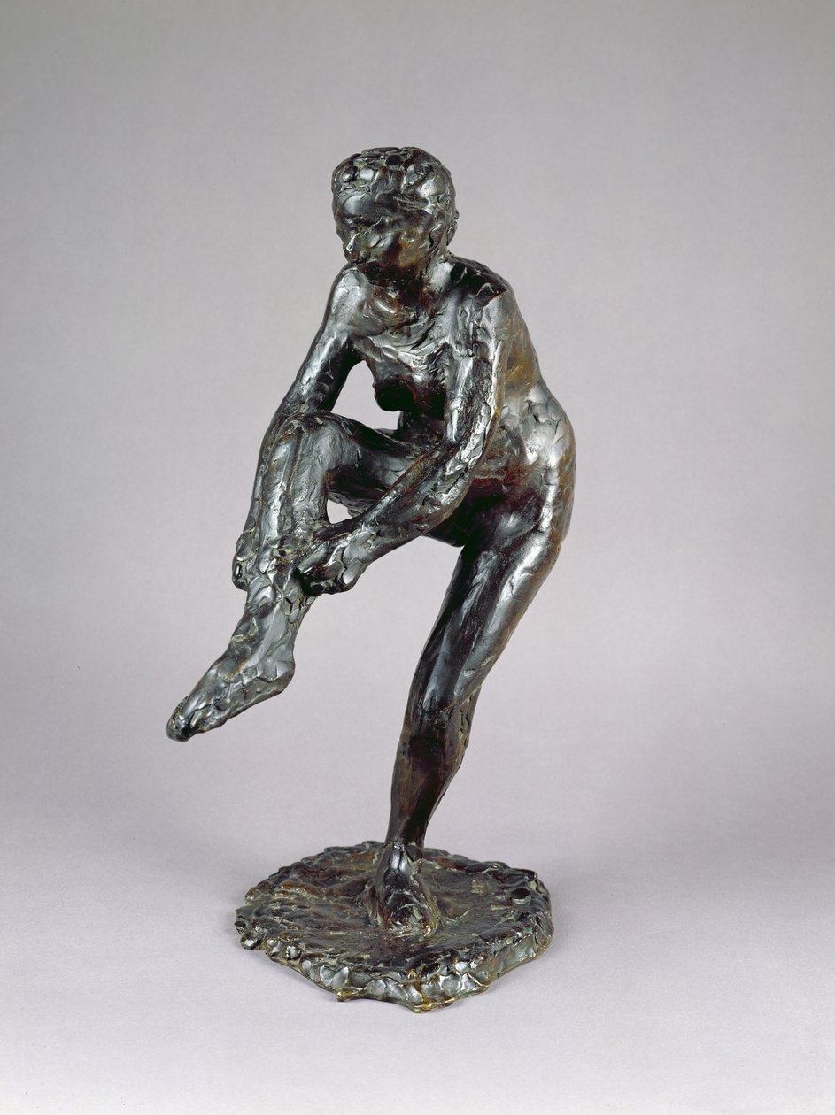 Tänzerin zieht ihre Strümpfe an von Edgar Degas