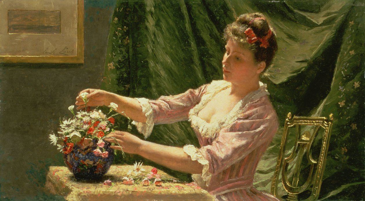 Junge Frau arrangiert Blumen von Emile Claus