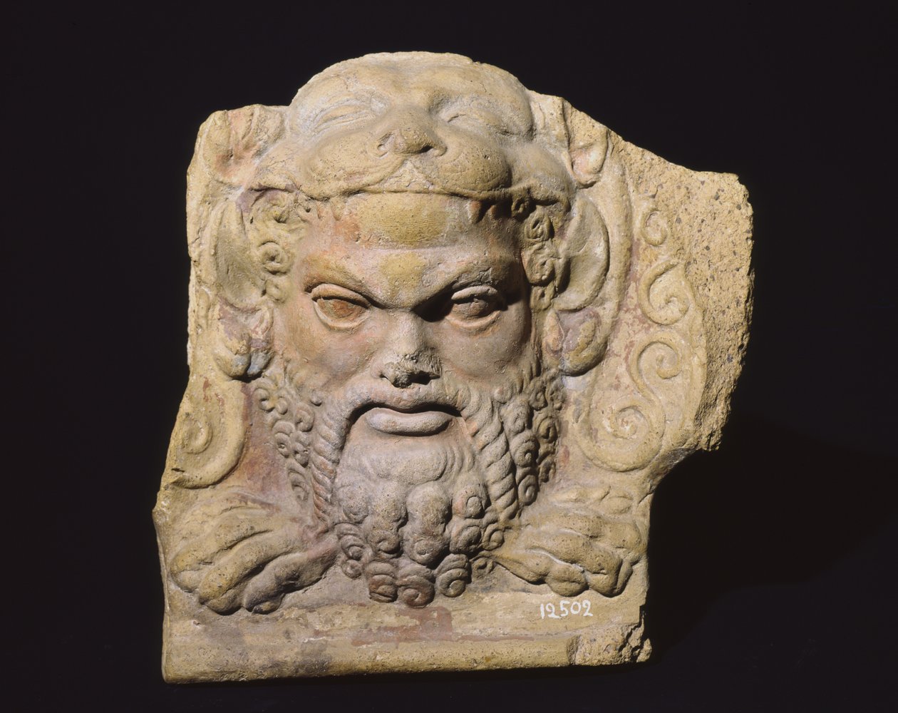 Antefix, das den Kopf eines Mannes darstellt, aus dem Tempel von Sassi Caduti in Falerii von Roman
