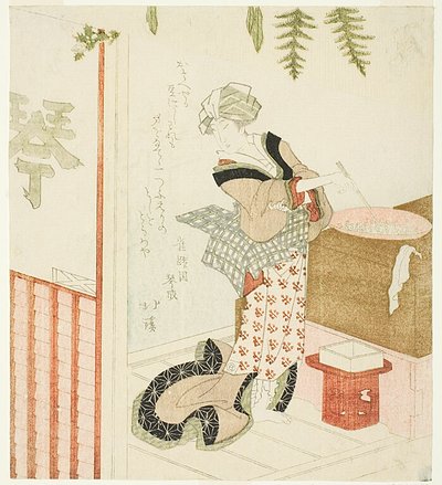 Frau kocht Bohnen im Laden von Totoya Hokkei
