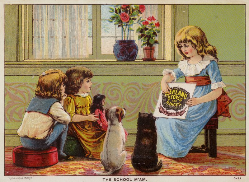 Kinder sitzen auf dem Boden von American School